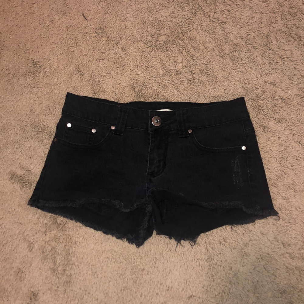 Black Forever 21 denim shorts.